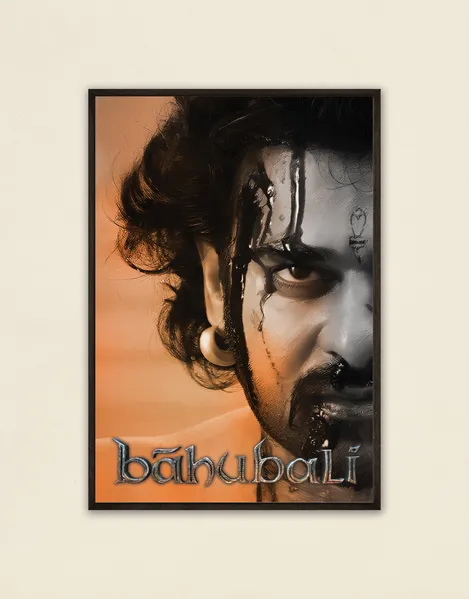 Celebrate the epic legacy with this Baahubali poster. Featuring the warrior’s intense gaze, it’s perfect for fans of the cinematic saga. Shop now at SmallBig!